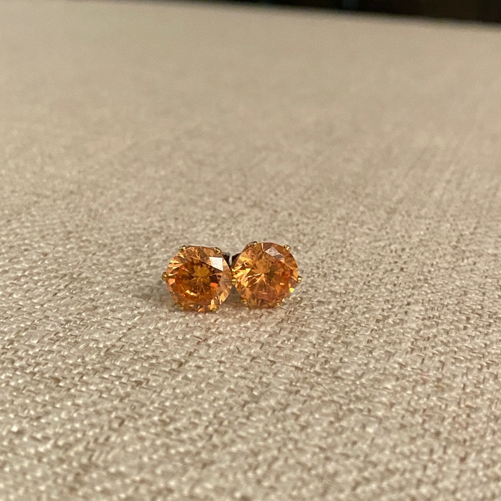 Amber stud earrings with gold backing
